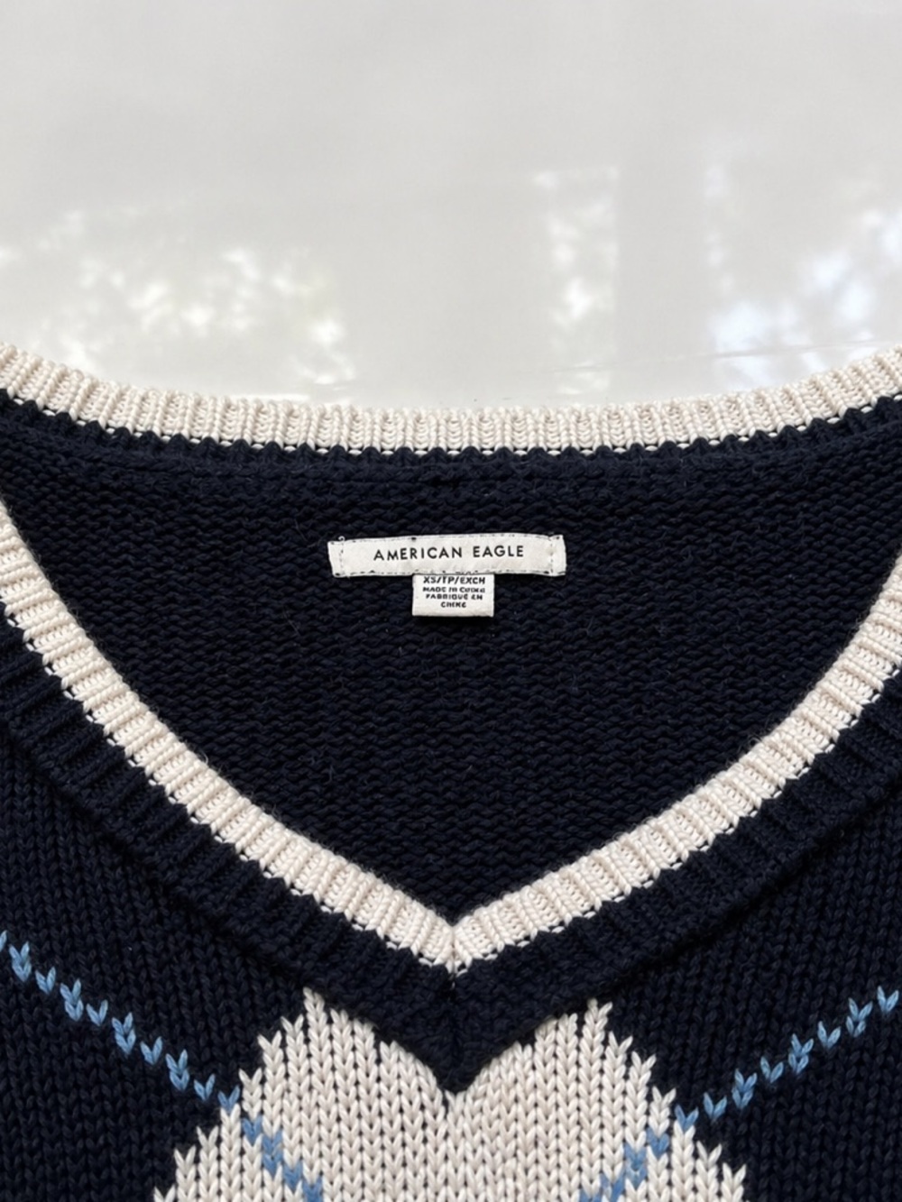 American Eagle Outfitters Navy, Ivory & Light Blue Argyle V-Neck Sweater - Picture 2 of 2